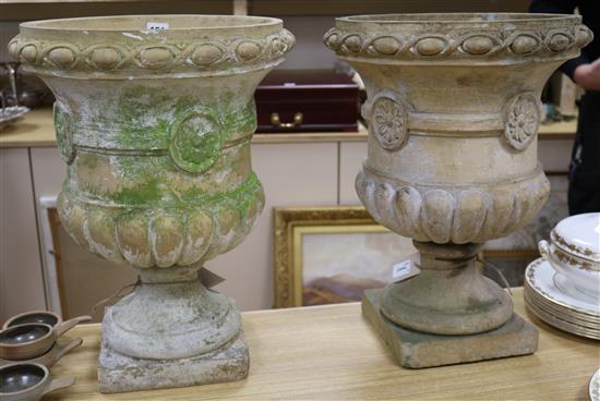 A pair of terracotta campana-shaped garden urns, H 48cm approx